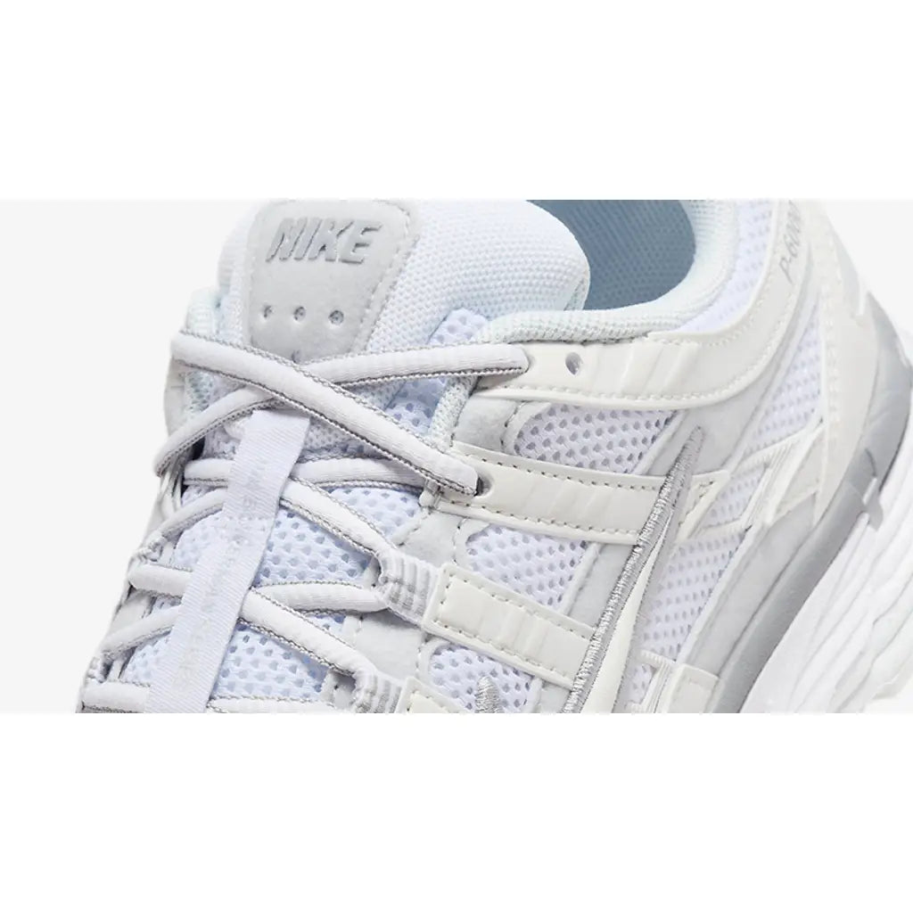 White sneaker with Nike logo on a white background