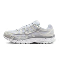 White running shoe with gray accents on a white background