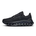Black soccer cleats with blue accents on a white background